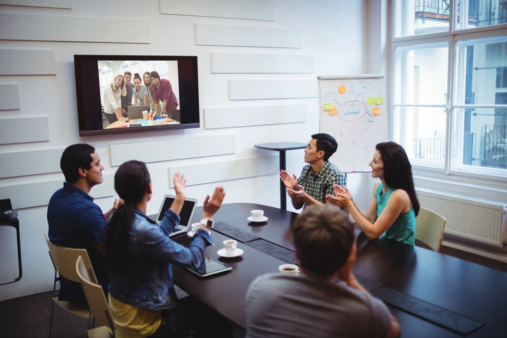 business-executive-applauding-video-conference_1170-1925